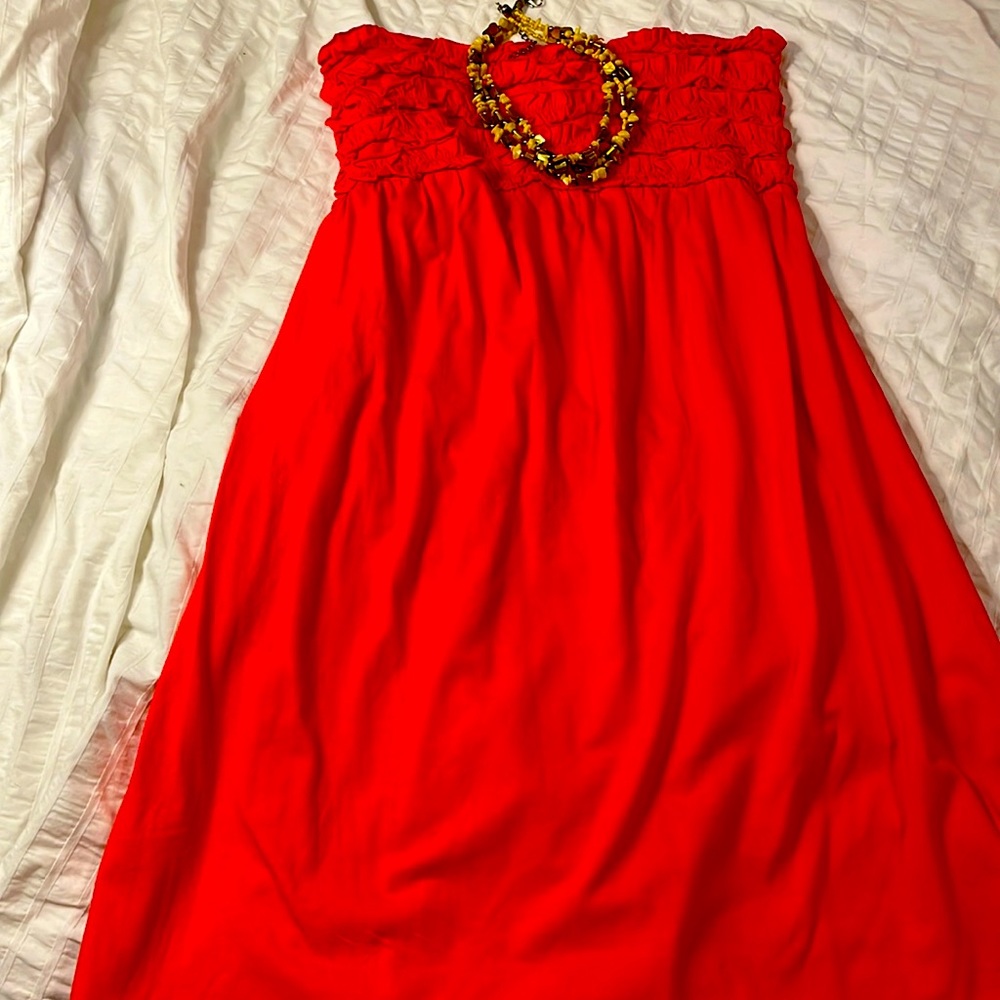 Perfect for a get away, necklace and hat included.